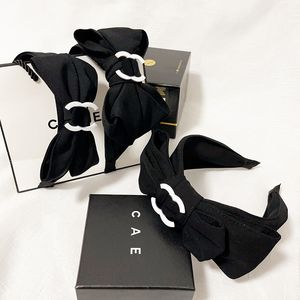 Diadema de tela negra pura, diadema con lazo de gran tamaño, estilo coreano simple, nuevo diseñador de joyas para el cabello, diadema de regalo de amor de lujo con el logotipo correcto