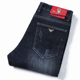 Pur coton coréen automne hiver marque de mode bleu noir jean hommes élastique personnalisé petit pied pantalon droit