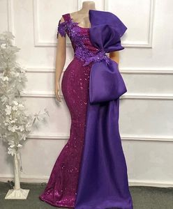 Robes de soirée à paillettes violettes avec grand nœud encolure dégagée dentelle brillante Appliqued perles sirène robes de bal robe de soirée￩e de mariag