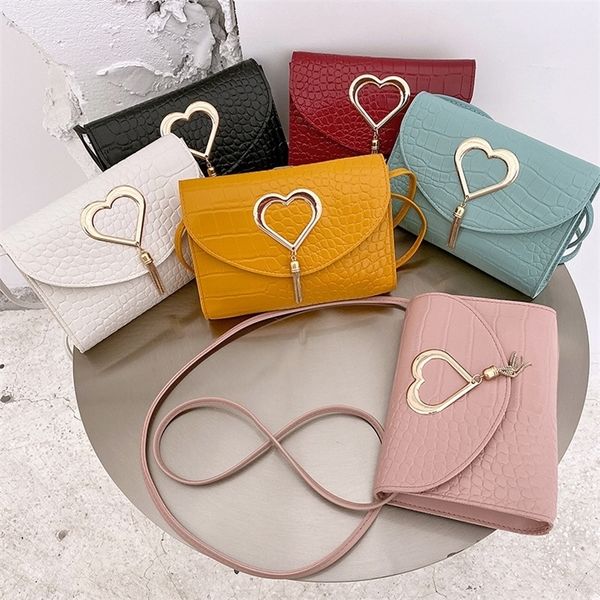 Monederos y bolsos para niñas Bolso de diseñador de lujo para mujeres Lindo lado Monederos de moda Satchels Bolso para mujer PU Bolsa de lápiz labial 220815