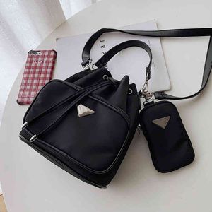 Portemonnees outlet tas dames nieuwe messenger slinger schouder emmer kind moeder hobo drie in één onderarm tas