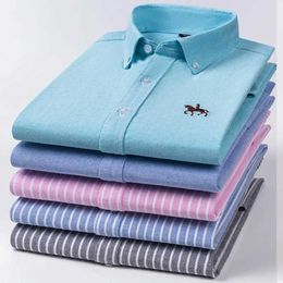 Qianxin vêtements printemps et automne chemises à manches longues pour hommes nouveau pur coton Oxford Textile décontracté chemise à carreaux sans repassage