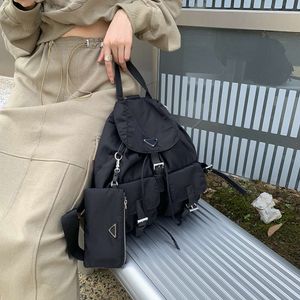 Qiao Ge sac de loisirs femmes automne hiver nouveau sac à dos de grande capacité tissu Oxford voyage simple multi-fonctionnel ventes directes d'usine