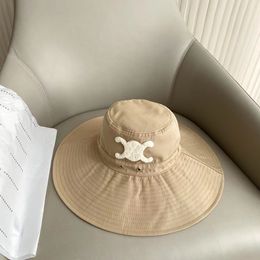 QJSF brede rand hoeden emmer hoed ontwerper Solid Sun for Women Men Men Beach Fashion String verstelbare petten
