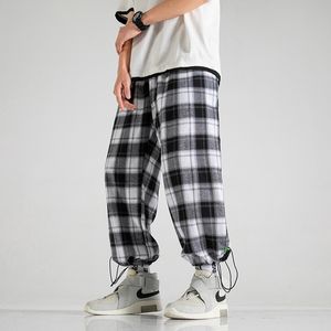 Qnpqyx Nieuwe Koreaanse mannen Plaid Pants Vintage Drawstring Joggers brede rechte broek Man Streetwear mode oversized geruite broek