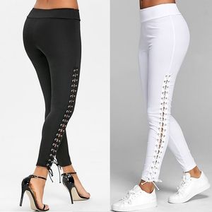 QNPQYX nouvelles femmes maigre long bandage pantalons de yoga dames course fitness leggings mince crayon pantalon solide évider long pantalon en gros