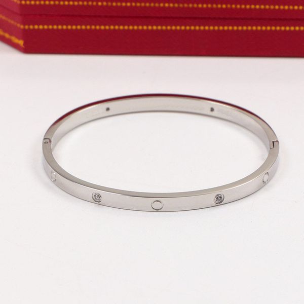 Bracelet de mode de qualité bracelet en or diamant en acier inoxydable célèbres créateurs de luxe marque bijoux femmes couple vis amour 4 diamants avec boîte en gros