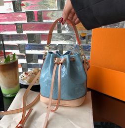 Kwalitatieve bedrukte emmertas met trekkoord dames zomer buitenlandse handel mode tas textuur niche enkele schouder crossbody tassen