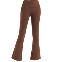 "Pantalon de yoga nu pour femme, confortable et élégant - Taille galbante, coupe évasée, parfait pour le fitness et le jogging - Pantalon évasé à neuf points pour un look sportswear impeccable !"