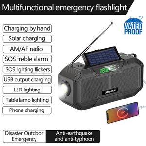 Radio Abbree IPX6 Auto-Scan Auto Scan d'urgence Radio Radio Solar Hand Crank portable AM / FM Radio 5000mAh pour la maison extérieure avec lampe de poche