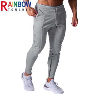 RainbowTouches 2021 Nuevos pantalones de jogging Hombres Pantalones de fitness Slim Zipper Absorción y pantalones de chándal Wicking Casual Pantalones deportivos Y0804