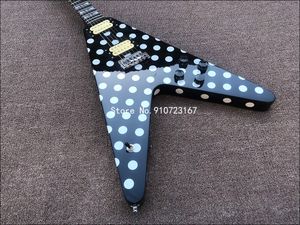 Randy Rhoads Lunares blancos Negro V Guitarra eléctrica Diapasón de palisandro Incrustaciones de pajarita Puente trémolo Whammy bar Hardware cromado Afinadores Grover