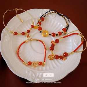 Echt goud vergulde agaat Dragon-vormige zegentas geweven touw China-chic niche-ontwerparmband modieuze nieuwe hand sieraden