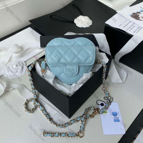 Diseñador de moda de cuero real Bolsos de canal de corazón cruzado Bolso de hombro de calidad para mujer Bolso de mano para mujer Bolso de compras para mujer alto