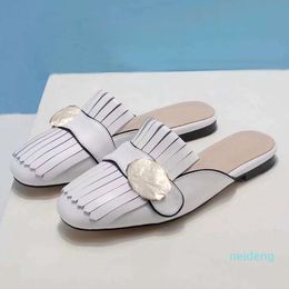 Zapatillas de moda de cuero real Zapatillas de mujer zapatos planos de diseño Metal Hebilla cómoda Primavera Otoño Zapatos de mujer Baotou 20154