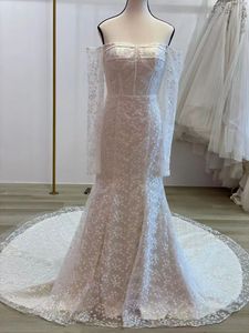 Photos réelles robes de mariée sirène en dentelle avec manches longues Boho plage longue traîne robes de mariée hors épaule Corset transparent dos nu boutons mariée robe De Novia