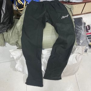 Fotos reales Pantalones de chándal Casual ancho cordón pantalones largos hombres mujeres pantalones