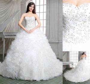 Fotos reales Vestido de fiesta Vestidos de novia de diseñador de iglesia Apliques de lujo con cordones Tren de corte Vestidos de novia transparentes Cariño con volantes5968709