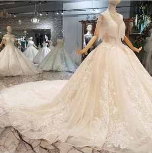 Echte foto's luxe trouwjurken hoge hals kralen kant applicaties glitter sweep trein Dubai Arabische bruidsjurken met gratis petticoat