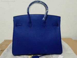 Taurillon cuir granuleux couleur bleu royal fourre-tout sac à main serrure et clés double poignées supérieures sac à main