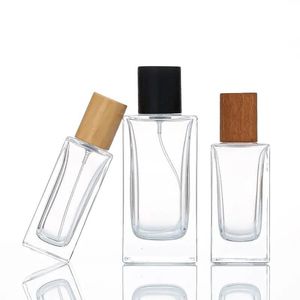 Botellas de vidrio rectangulares con tapa de madera Botella de perfume Botellas de vidrio en aerosol Nxcrk