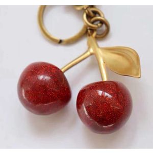 Porte-clés rouge Style cerise, bâton de couleur, couverture de rouge à lèvres, équipe, baume à lèvres, Cozybag, pièces Mode Fashion55
