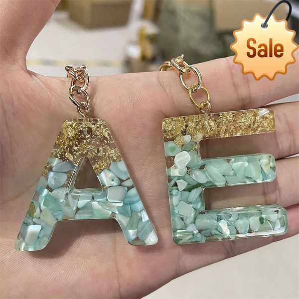 Llavero con letras en inglés de resina, pegamento en forma de gota de lámina dorada, decoración colgante con 26 palabras en inglés, joyería de piedra Popular europea y americana