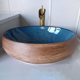 Lavabos de baño retro cuenca de encimera de cerámica europea hotel oval hotel fabricante de arte doméstico de casa
