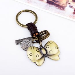 Retro Letter Charm Metalen Vlinder Sleutelhanger Lederen Sleutelhanger Tas Ophangingen Ornament Mode-sieraden