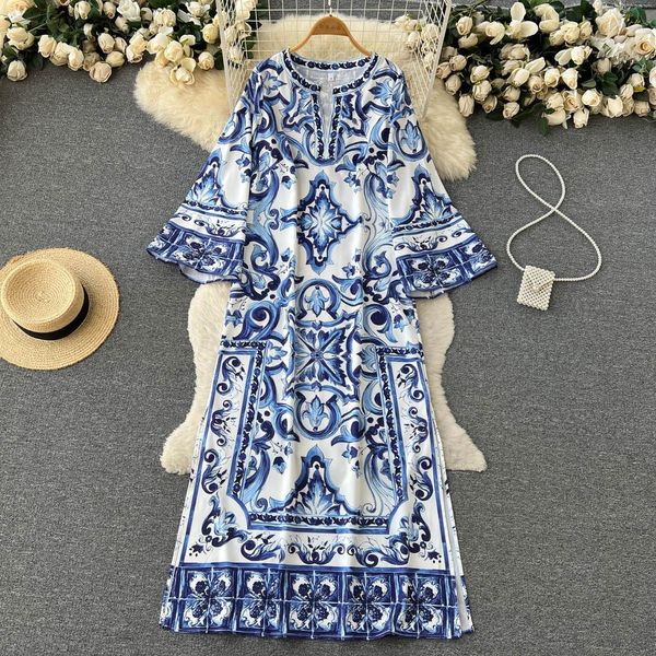 Retro Niche Design imprimé élégant V Robe de cou d'été pour femmes de style ethnique Fashion lâche