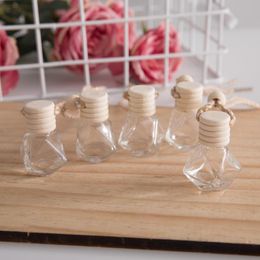 Rhombische etherische oliën diffuseert auto -luchtverfrisser hanger parfum flesglas ornamenten leeg heldere flessen rond houten deksel luchtverfrisser w0142