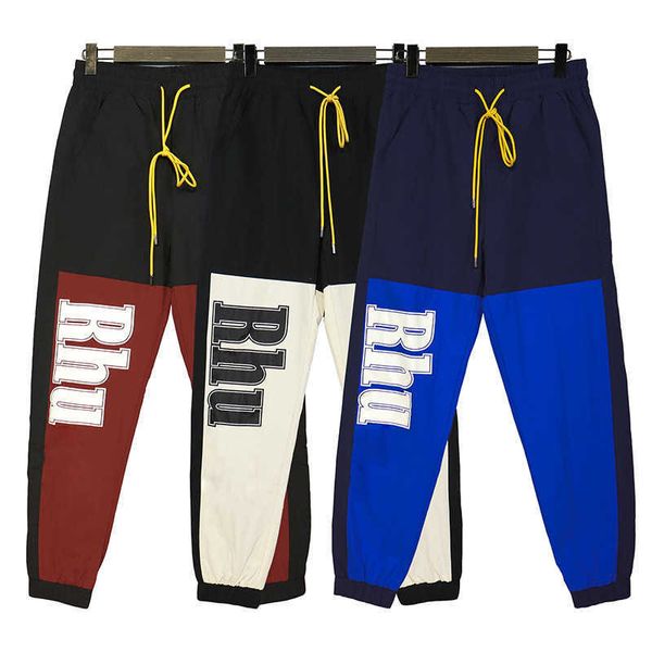 RHUDE American High Street Fashion Alphabet Impression Panneau Couleur Contraste Hip Hop Mode Casual Tissé Leggings Pantalon