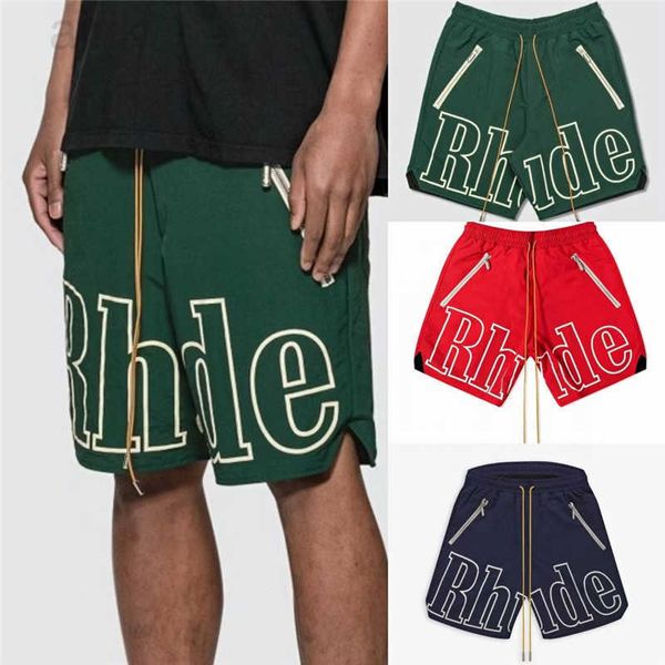 Rhude Baloncesto Hombres Pantalones Cortos Sexy para Hombres Mujeres Letra Grande Breechcloth Amarillo Cordón Píldora Cabeza Imprimir Gimnasio