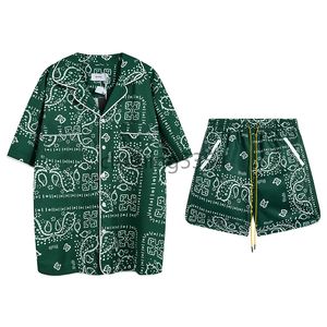 Rhude Designer Conjunto de camisa para hombre Camisa Rhude y traje corto Hombres Camiseta de manga corta de alta calidad Camiseta Rhude Pantalones cortos de playa Pantalones cortos de cuero Ropa deportiva de verano para nadarW2FY