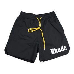 Rhude Desinger Pantalones cortos deportivos de moda para hombre y mujer, pantalones cortos de cuero, tallas estadounidenses S-XL