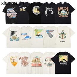 Rhude High End Designer Vêtements pour distinguer la lettre de monnaie du marché Impression d'été Nouveau couple Trad T-shirt à manches courtes en vrac avec des étiquettes originales de 1: 1