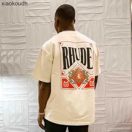 Ropa de diseñador Rhude High End para la tarjeta de juego de moda Hip Hop Impreso Camiseta de hombre y hombre suelto de manga corta para hombres y camiseta para mujer con etiquetas originales 1: 1