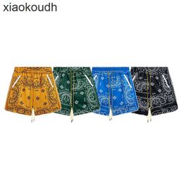 Rhude high -end designer shorts voor chaopai micro etnische cashew casual quick shorts voor mannen en dames high street strand elastische capris met 1: 1 originele labels