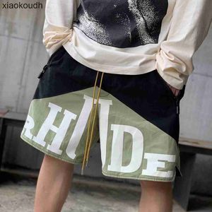Rhude High End Designer Shorts voor High Street Letter Gedrukte tweekleurige splicing Drawstring Trend Casual Street Shorts met 1: 1 originele labels