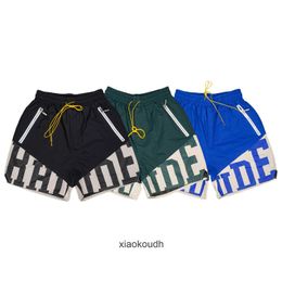 Rhude High End Designer Shorts pour Street Thin Breathable Mesh Imprimer à masse rapide Casual Sports Basketball Ments et Shorts pour femmes avec des étiquettes originales de 1: 1