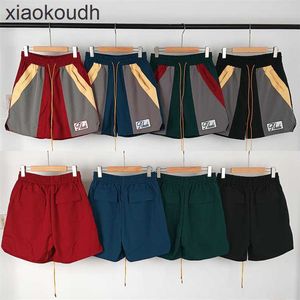 Rhude high -end designer shorts voor trendy geborduurde kleur matching die op elastische heren en dames casual sport shorts met 1: 1 originele labels