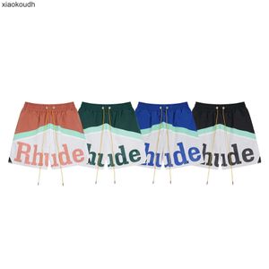 Rhude high -end designer shorts voor trendy kleurblokletter Casual sport mesh shorts voor mannen en vrouwen high street elastische strandbroek met 1: 1 originele labels
