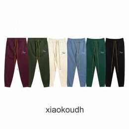 Pantalones de diseñador de alta gama Rhude para los 24 años de lema bordado de moda pantalones deportivos casuales para hombres y mujeres pantalones de guardia de la calle con etiquetas originales 1: 1