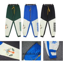 Pantalones de diseñador de alta gama Rhude para pantalones casuales de otoño, color de contraste, azar, moda para hombres, leggings con etiquetas originales 1: 1