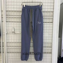 Pantalon de concepteur haut de gamme Rhude pour un pantalon de boucle de crampon à slogan brodé avec des étiquettes originales 1: 1