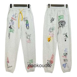 Pantalon de créateur haut de gamme Rhude pour pantalon décontracté à main de dessin animé de rue pour hommes et femmes pantalons sportifs minces à la mode avec des étiquettes originales de 1: 1
