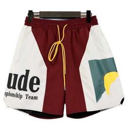 Rhude Mens Mesh Shorts Moda Uomo Donna Casual Skateboard riflettente Hip Hop Tasca da spiaggia Bordo bianco di alta qualità Corto Nero Blu Rosso Verde Formato asiatico S-xl 8 M1AJ