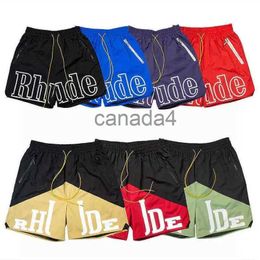 Rhude Mens Shorts Athletic Casual Mesh Short Men Dames Hoge kwaliteit Classic Beach Fashion Luxury Designer Street Hip Hip Blue Green en Red Size S-XL NBSK CZO3