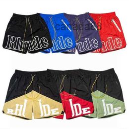 RHUDE MENS Shorts Athletic Casual Mesh Men Hommes Femmes de haute qualité Classic Beach Fashion Luxury Designer Street Hip Hop Blue Blue Green and Red Size S-XL Schh