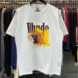 Rhude Shirt Castle Coconut Windowsill Scenic Casual Loose Rhude Mens T-shirt respirant à manches courtes T-shirt Men Femmes Couples Top 4098